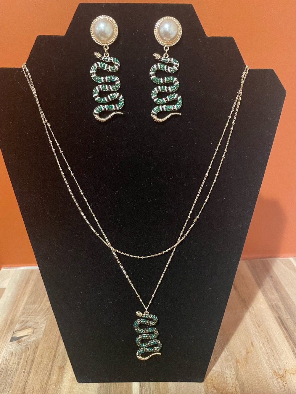Gold Layered Necklace and Earrings with Green Crystal Snake Pendant